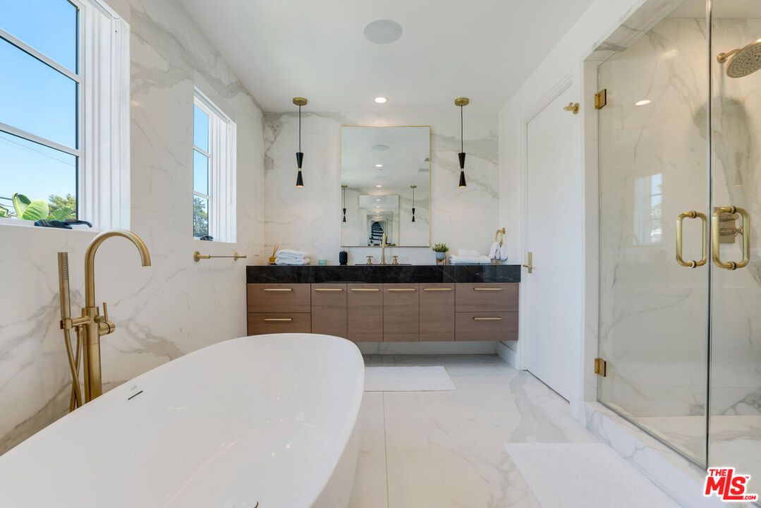 Bathroom, Dual Sink Vanities, Free Standing Baths, Glass Shower, Interior, Marble, Marble Walls, Recessed Lighting