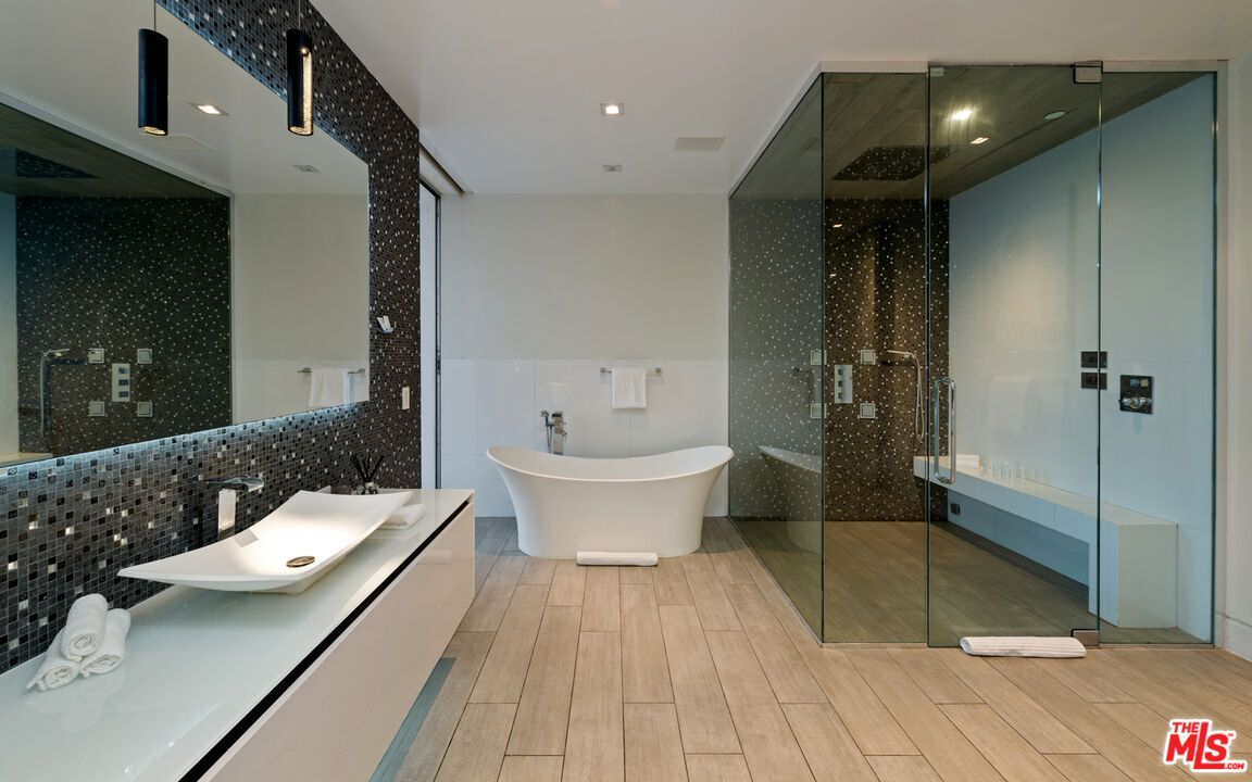Bathroom, Dual Sink Vanities, Free Standing Baths, Glass Shower, Interior, Recessed Lighting, Wood Texture Flooring