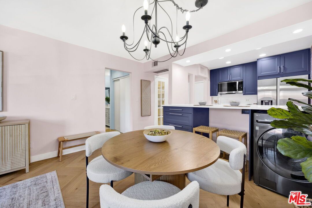 Chandelier, Dining room, Interior, Kitchen, Recessed Lighting, Stainless Steel Appliances, Wood Texture Flooring