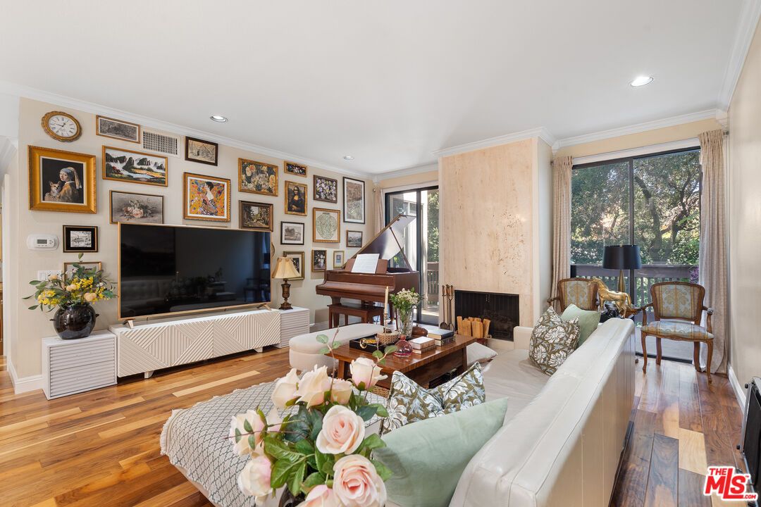 Fireplace, Interior, Living room, Piano, Recessed Lighting, Wood Texture Flooring