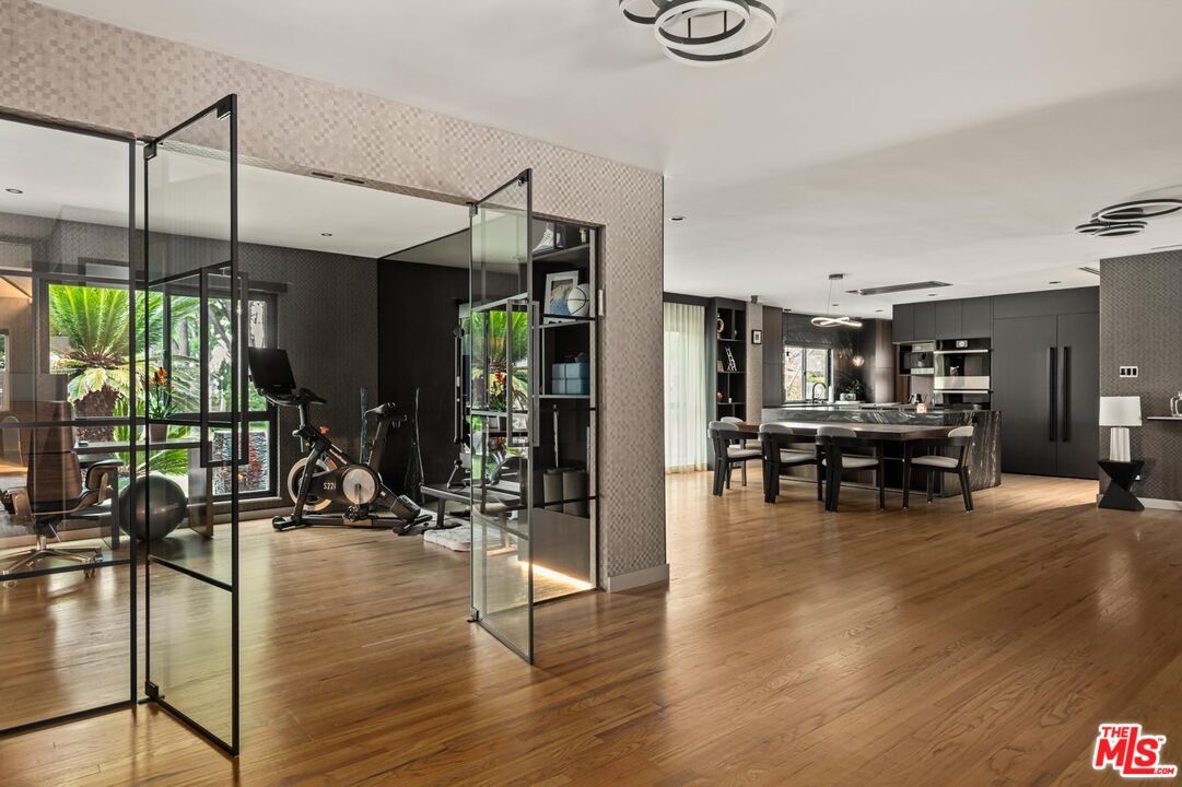 Dining room, Fitness Equipment, Interior, Kitchen, Pendant Lights, Wood Texture Flooring