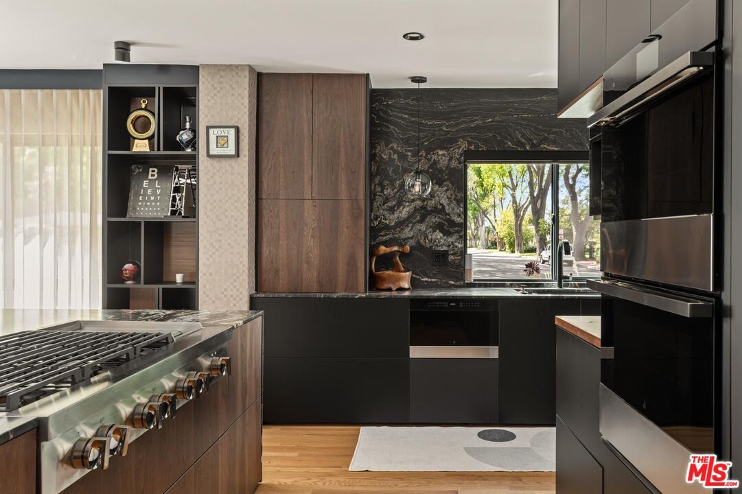 Interior, Kitchen, Marble Walls, Recessed Lighting, Stainless Steel Appliances, Wood Texture Flooring