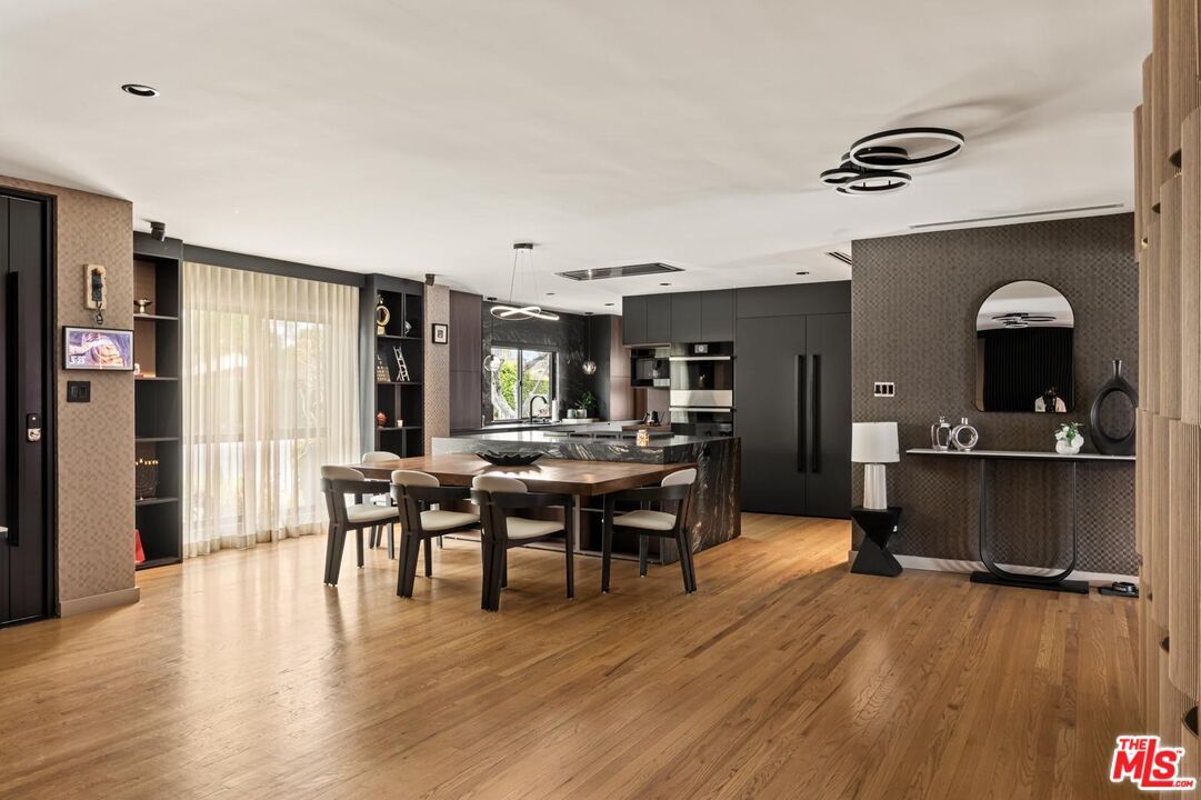 Dining room, Interior, Kitchen, Pendant Lights, Recessed Lighting, Stainless Steel Appliances, Wood Texture Flooring