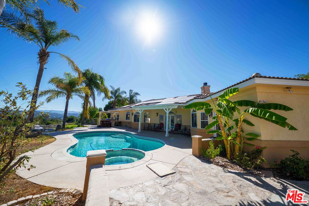 Exterior, Pool, Solar Panels