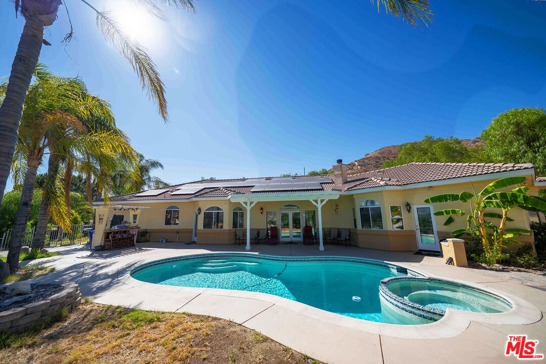 Exterior, Pool, Solar Panels