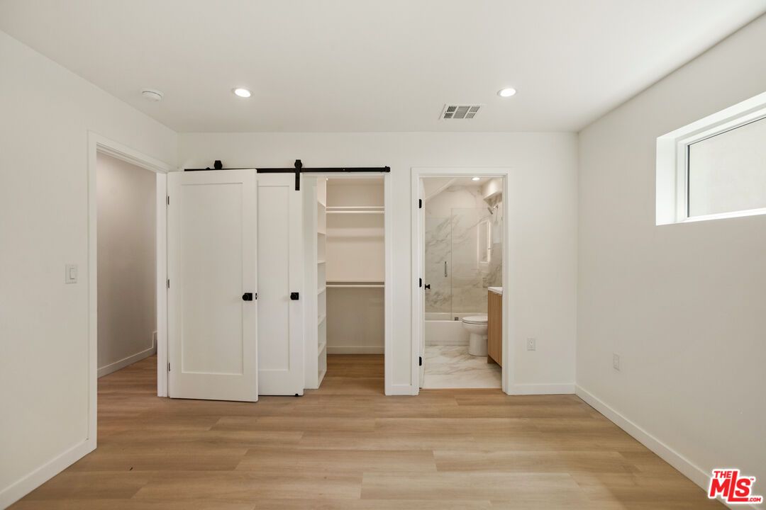 Bathroom, Empty room, Interior, Marble Walls, Recessed Lighting, Wood Texture Flooring