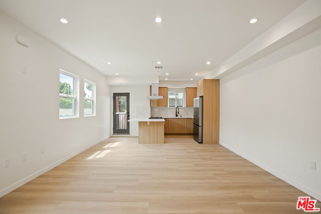 Interior, Kitchen, Marble Walls, Pendant Lights, Recessed Lighting, Wood Texture Flooring