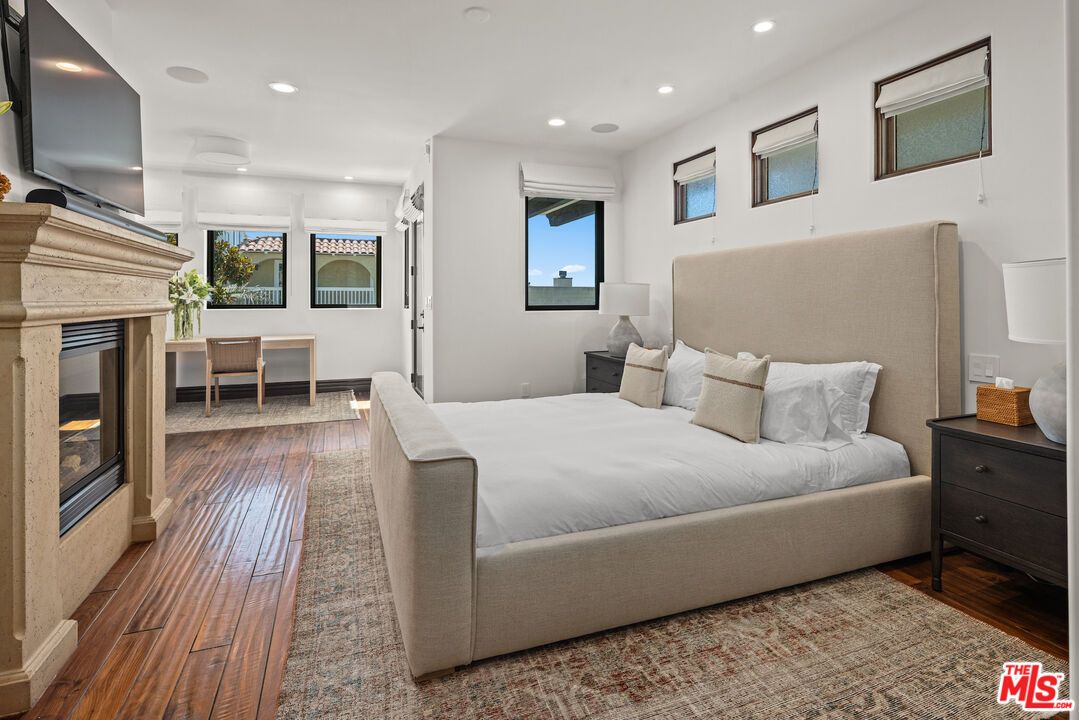 Bedroom, Fireplace, Interior, Recessed Lighting, Wood Texture Flooring