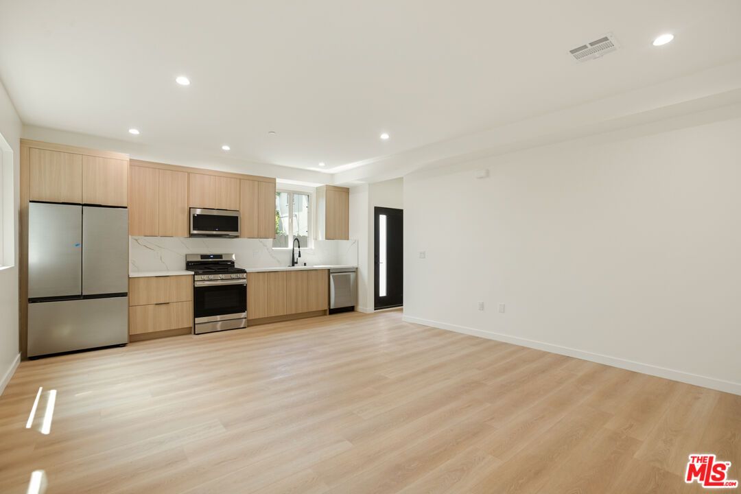 Interior, Kitchen, Recessed Lighting, Stainless Steel Appliances, Wood Texture Flooring