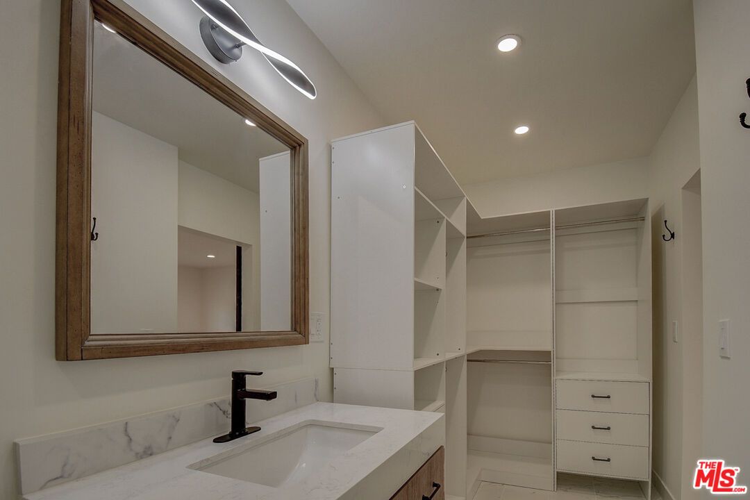 Bathroom, Dual Sink Vanities, Interior, Recessed Lighting, Walk-in Closets