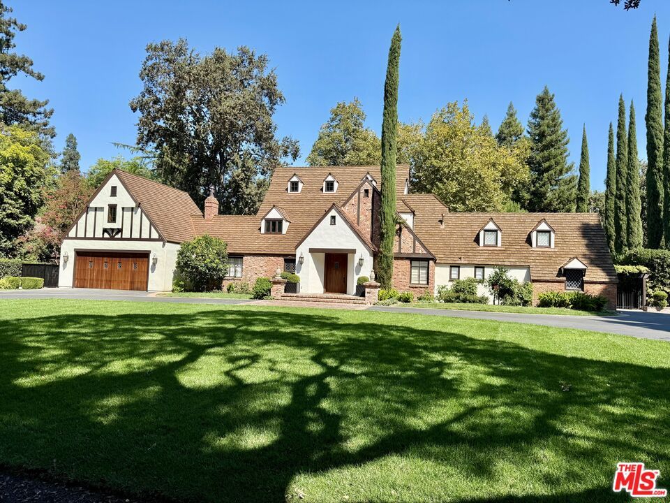 Attached, Backyard, Exterior, Facade, Brick Facade, Tudor Revival