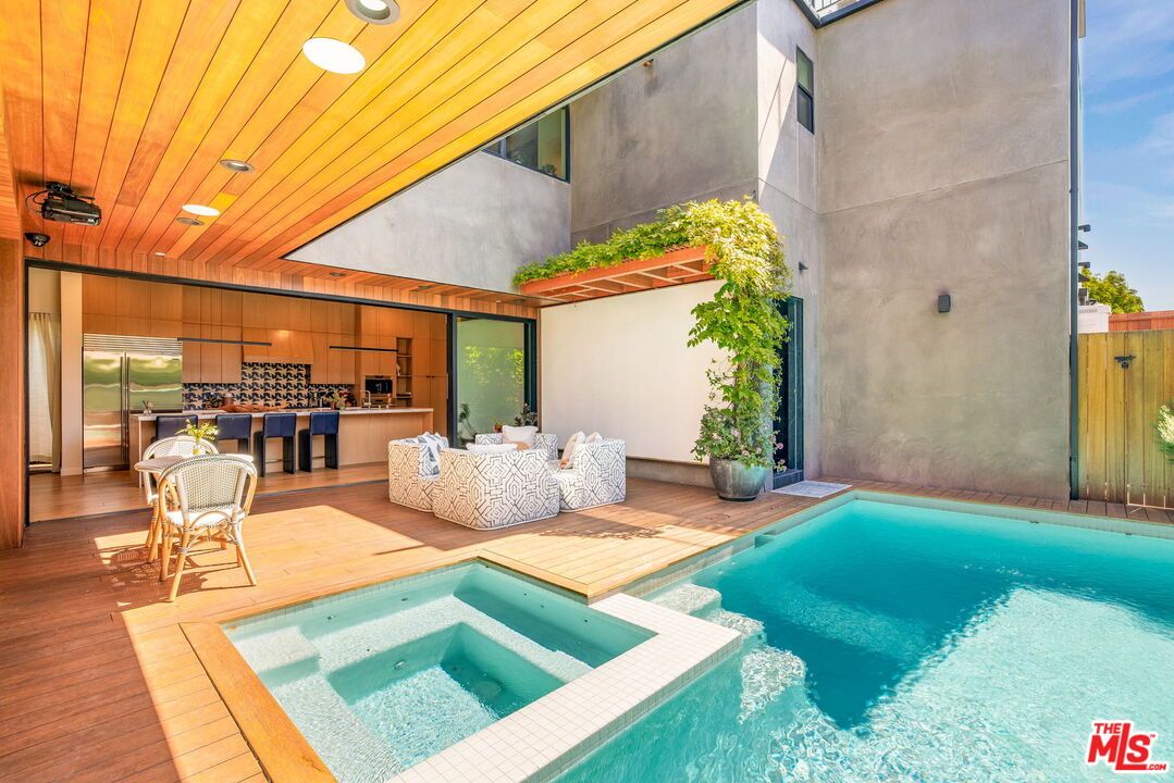 Exterior, Outdoor Kitchen, Pool, Wood Texture Flooring