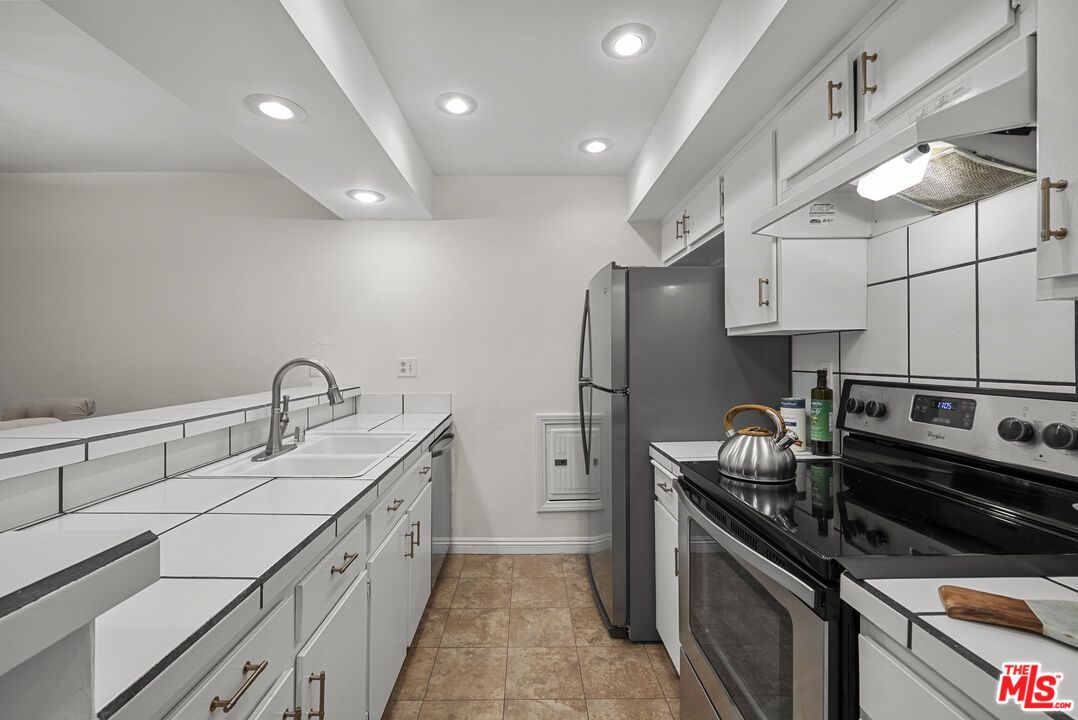 Interior, Kitchen, Recessed Lighting, Tile Countertops