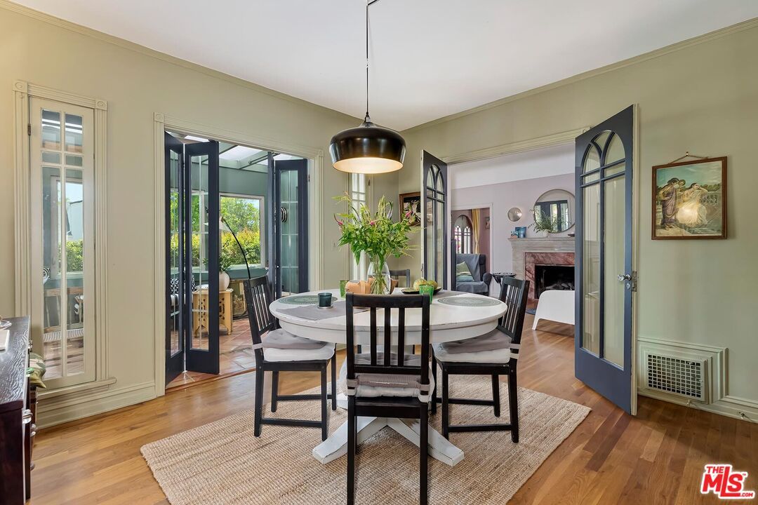 Dining room, Fireplace, Interior, Pendant Lights, Wood Texture Flooring