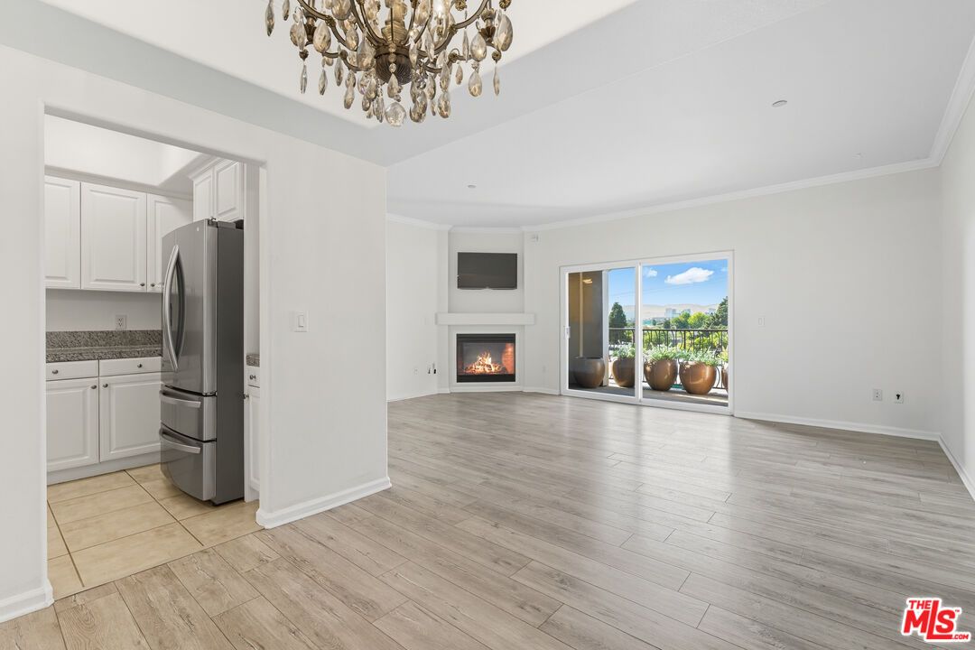 Chandelier, Empty room, Fireplace, Interior, Kitchen, Wood Texture Flooring