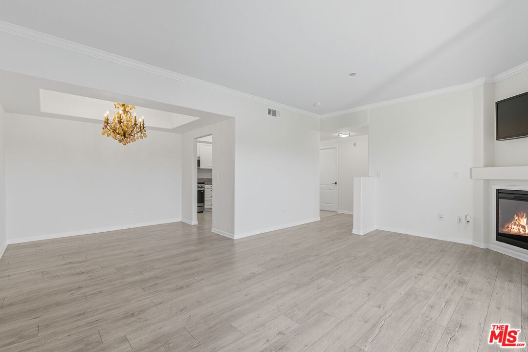 Chandelier, Empty room, Fireplace, Interior, Wood Texture Flooring