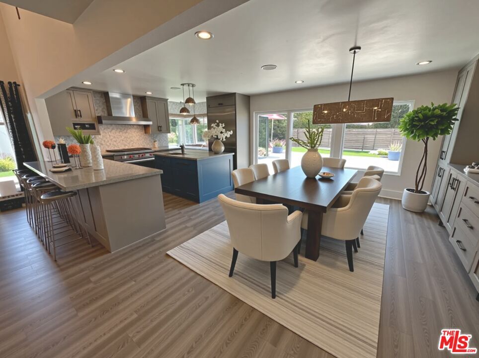 Dining room, Interior, Kitchen, Pendant Lights, Recessed Lighting, Stainless Steel Appliances, Wood Texture Flooring
