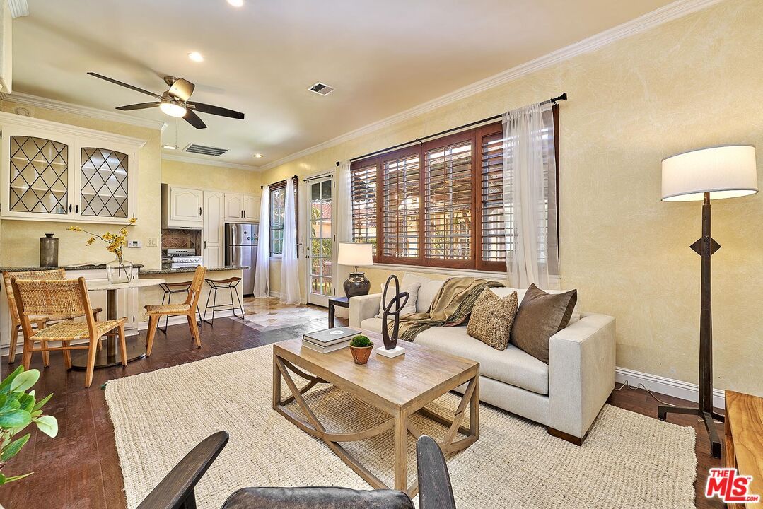 Dining room, Interior, Kitchen, Living room, Recessed Lighting, Stainless Steel Appliances, Wood Texture Flooring
