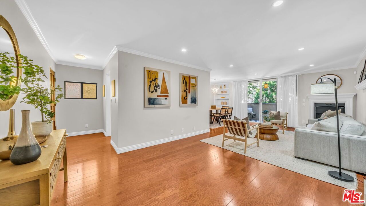 Dining room, Fireplace, Interior, Living room, Recessed Lighting, Wood Texture Flooring