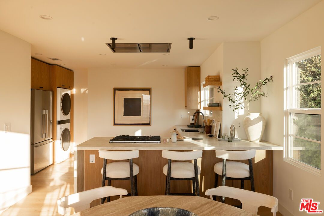 Interior, Kitchen, Recessed Lighting, Washer, Wood Texture Flooring