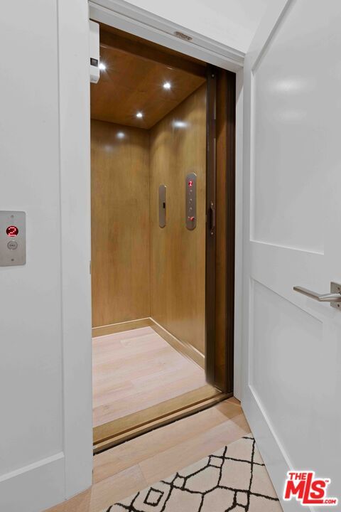 Elevator, Interior, Recessed Lighting, Wooden Ceilings, Wood Texture Flooring, Wooden Walls