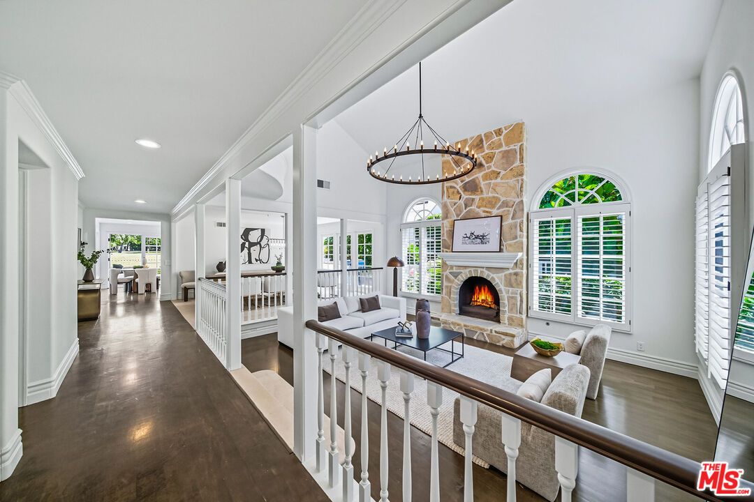 Chandelier, Fireplace, Interior, Living room, Pendant Lights, Recessed Lighting, Wood Texture Flooring