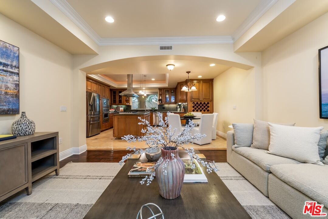 Dining room, Interior, Kitchen, Living room, Pendant Lights, Recessed Lighting, Stainless Steel Appliances, Wood Texture Flooring