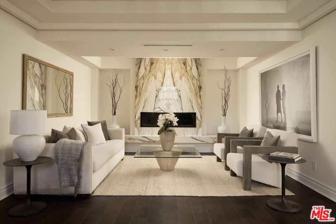 Fireplace, Interior, Living room, Marble Walls, Recessed Lighting, Wood Texture Flooring