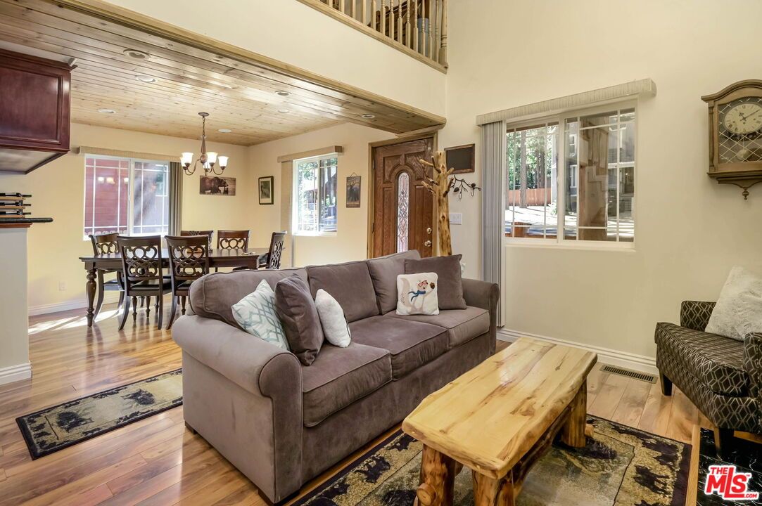 Chandelier, Dining room, Interior, Living room, Recessed Lighting, Wooden Ceilings, Wood Texture Flooring