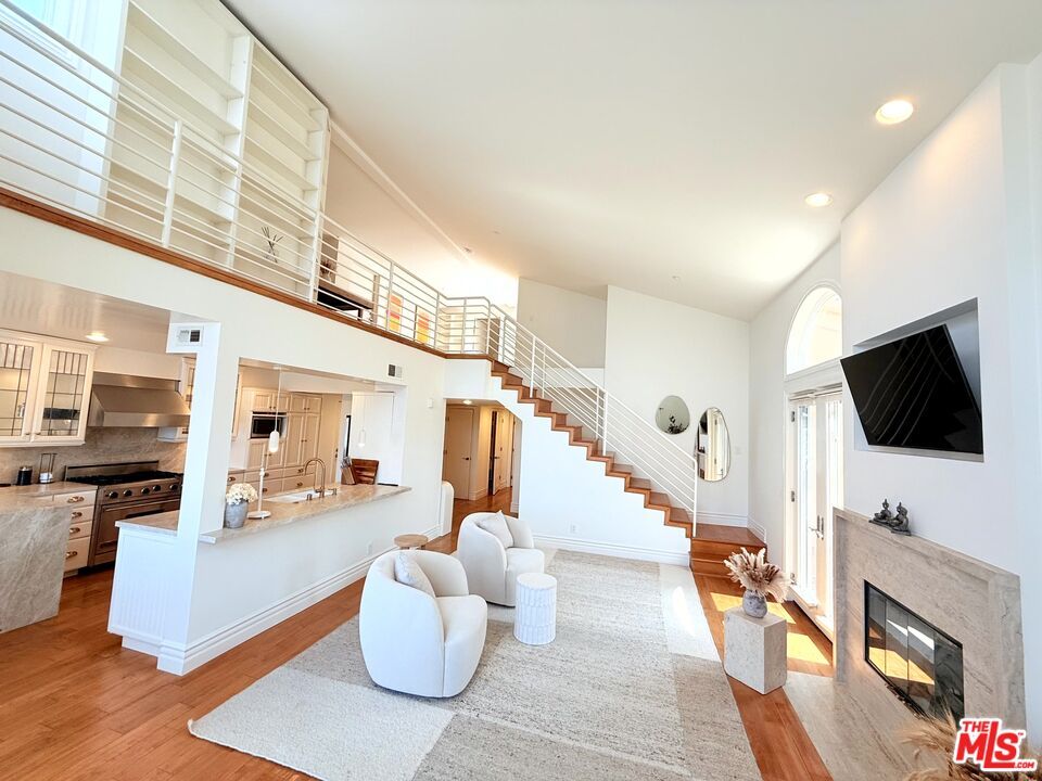 Fireplace, Interior, Kitchen, Living room, Recessed Lighting, Wood Texture Flooring