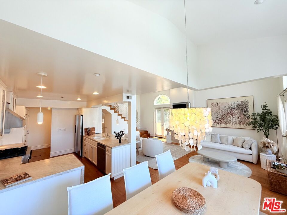 Dining room, Interior, Kitchen, Living room, Pendant Lights, Recessed Lighting, Stainless Steel Appliances, Wood Texture Flooring
