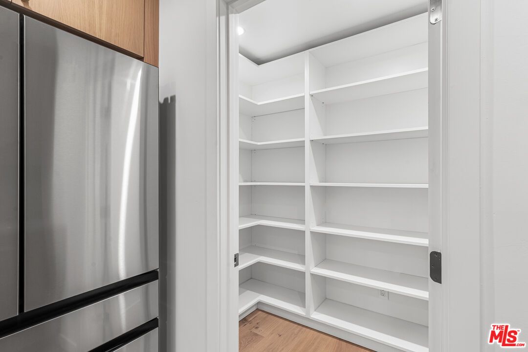 Interior, Recessed Lighting, Stainless Steel Appliances, Walk-in Closets, Wood Texture Flooring