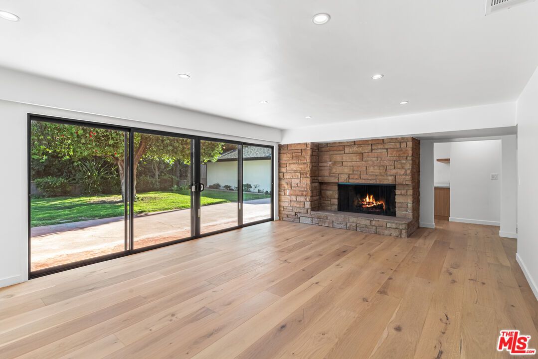 Empty room, Fireplace, Interior, Recessed Lighting, Wood Texture Flooring