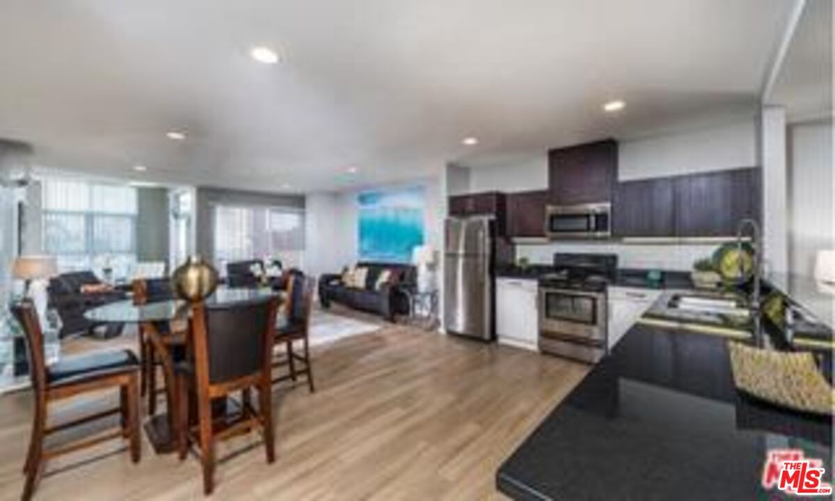 Dining room, Interior, Kitchen, Living room, Recessed Lighting, Stainless Steel Appliances, Wood Texture Flooring