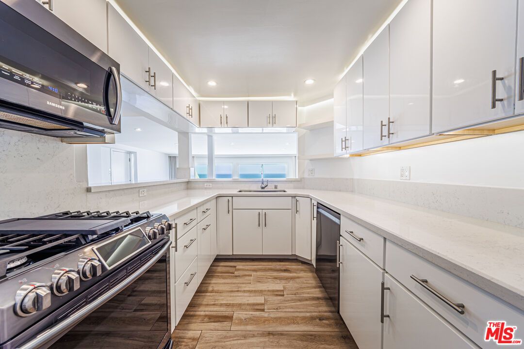 Interior, Kitchen, Recessed Lighting, Stainless Steel Appliances, Wood Texture Flooring
