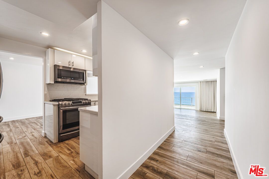 Interior, Kitchen, Recessed Lighting, Stainless Steel Appliances, Water, Wood Texture Flooring