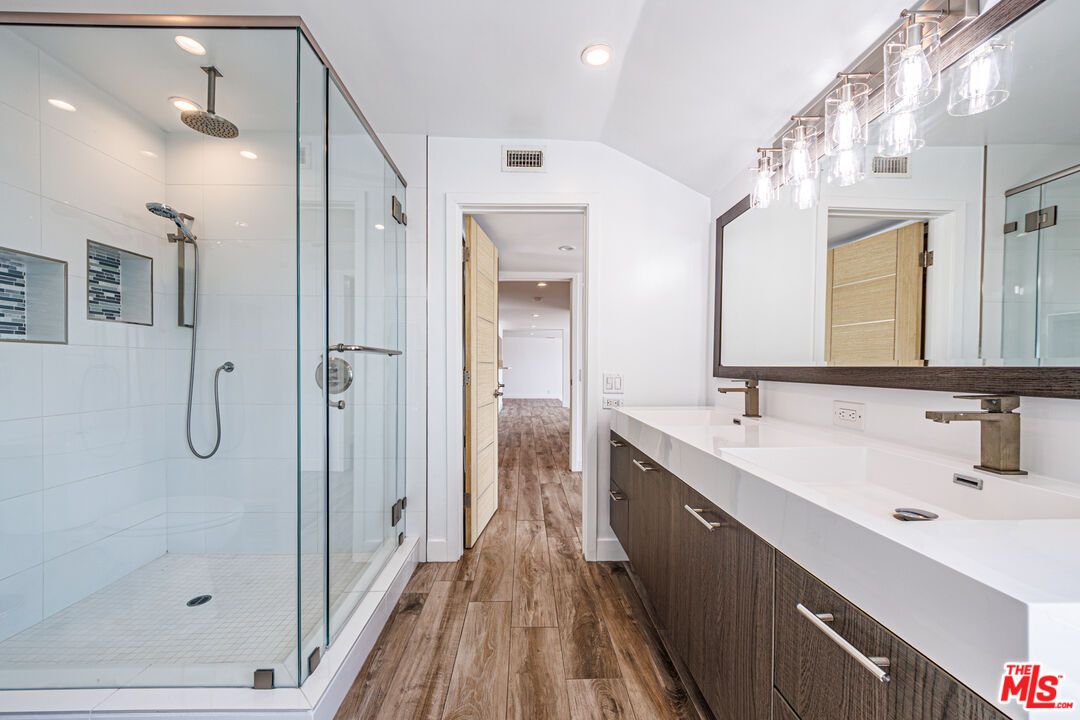 Bathroom, Dual Sink Vanities, Glass Shower, Interior, Recessed Lighting, Wood Texture Flooring