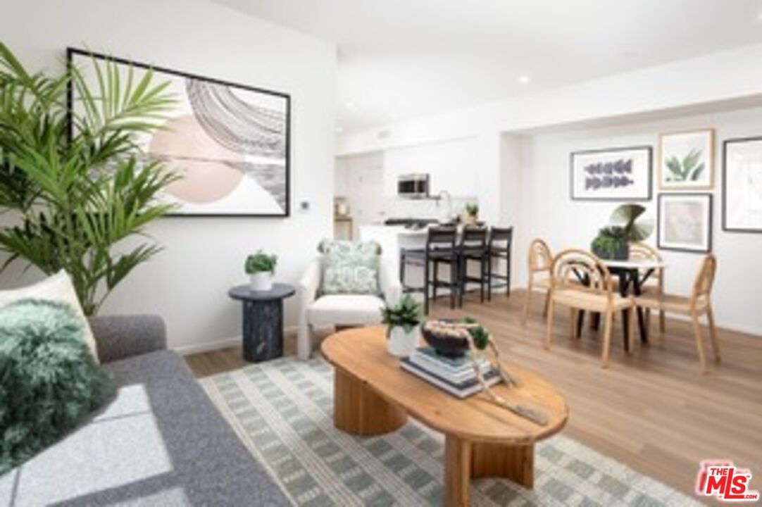 Dining room, Interior, Kitchen, Living room, Recessed Lighting, Stainless Steel Appliances, Wood Texture Flooring