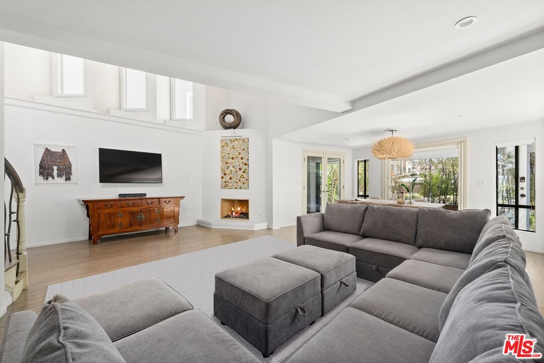 Chandelier, Fireplace, Interior, Living room, Recessed Lighting, Wood Texture Flooring
