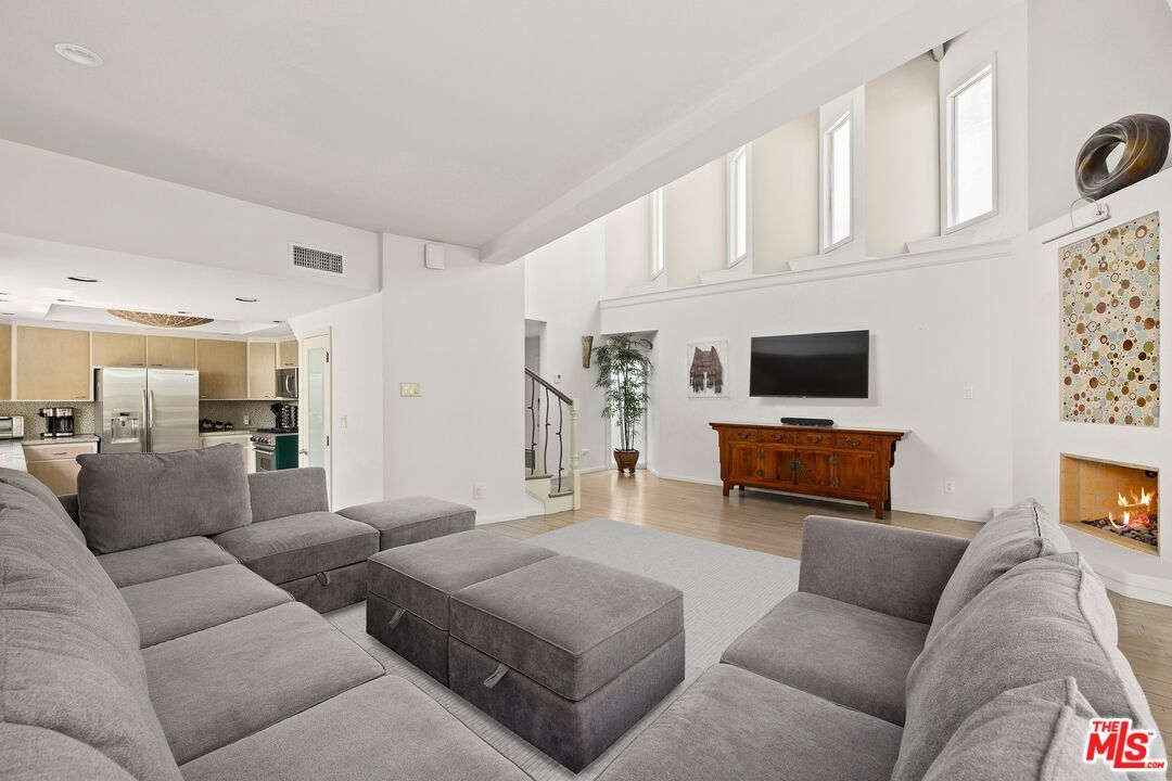 Fireplace, Interior, Kitchen, Living room, Stainless Steel Appliances, Wood Texture Flooring