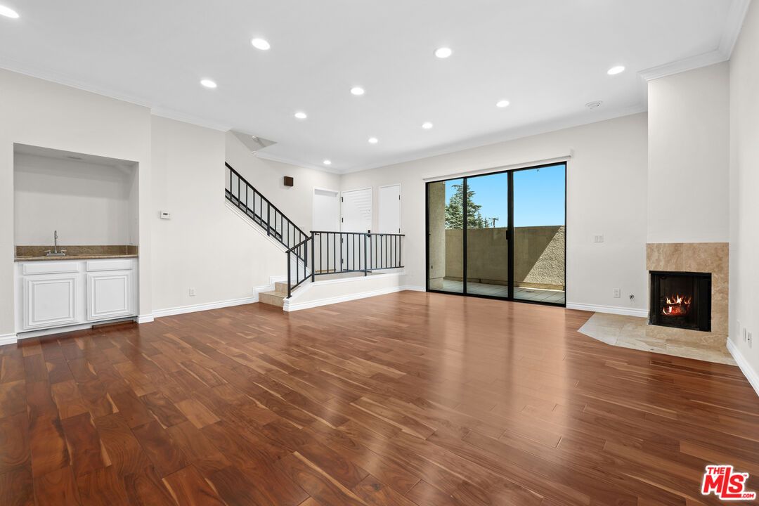 Empty room, Fireplace, Interior, Recessed Lighting, Wood Texture Flooring