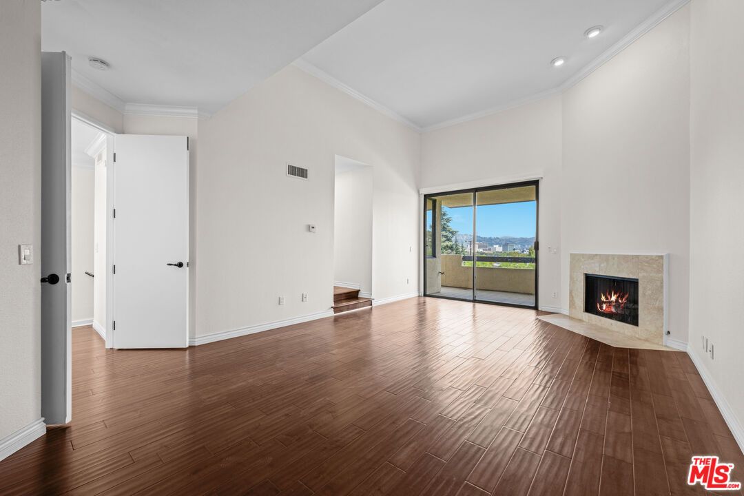 Empty room, Fireplace, Interior, Recessed Lighting, Wood Texture Flooring