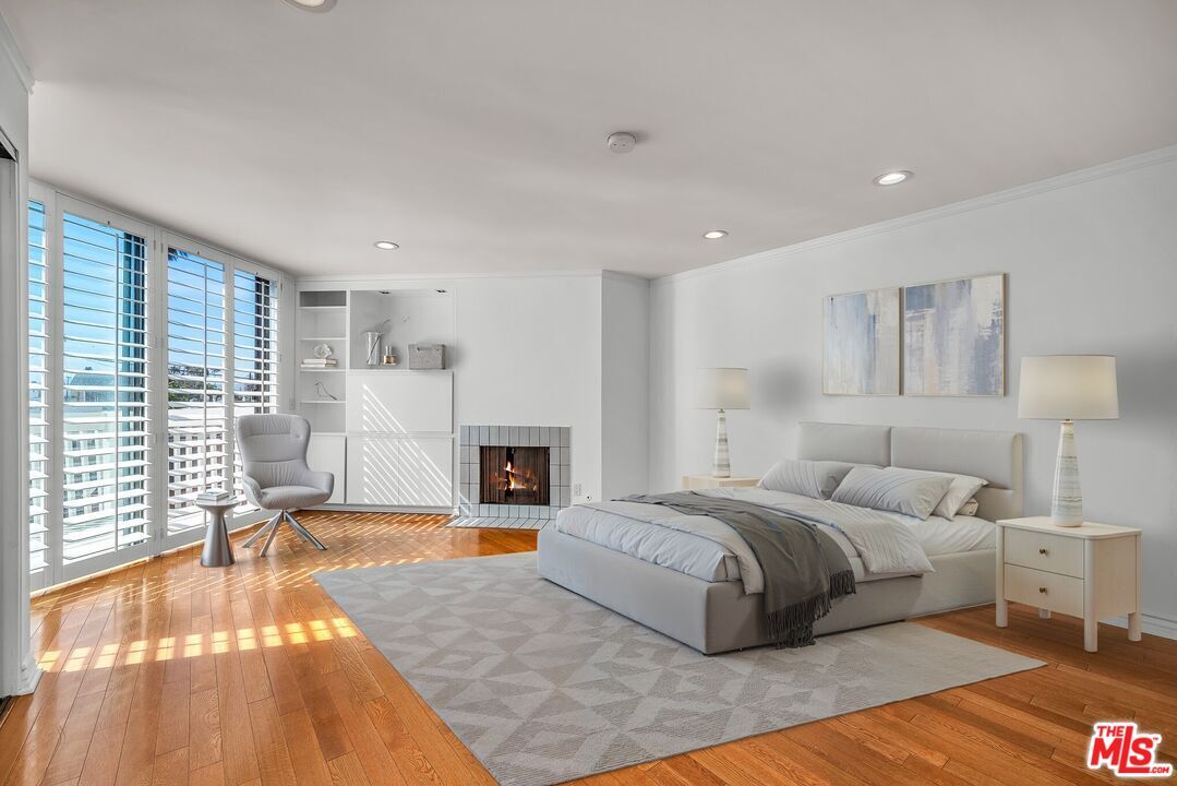 Bedroom, Fireplace, Interior, Recessed Lighting, Wood Texture Flooring