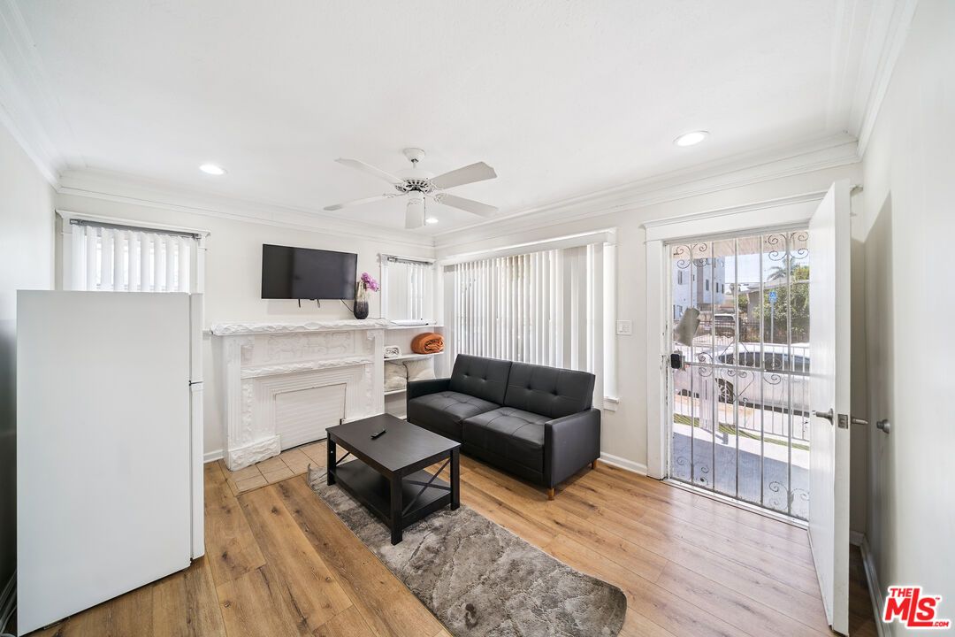 Fireplace, Interior, Living room, Recessed Lighting, Wood Texture Flooring