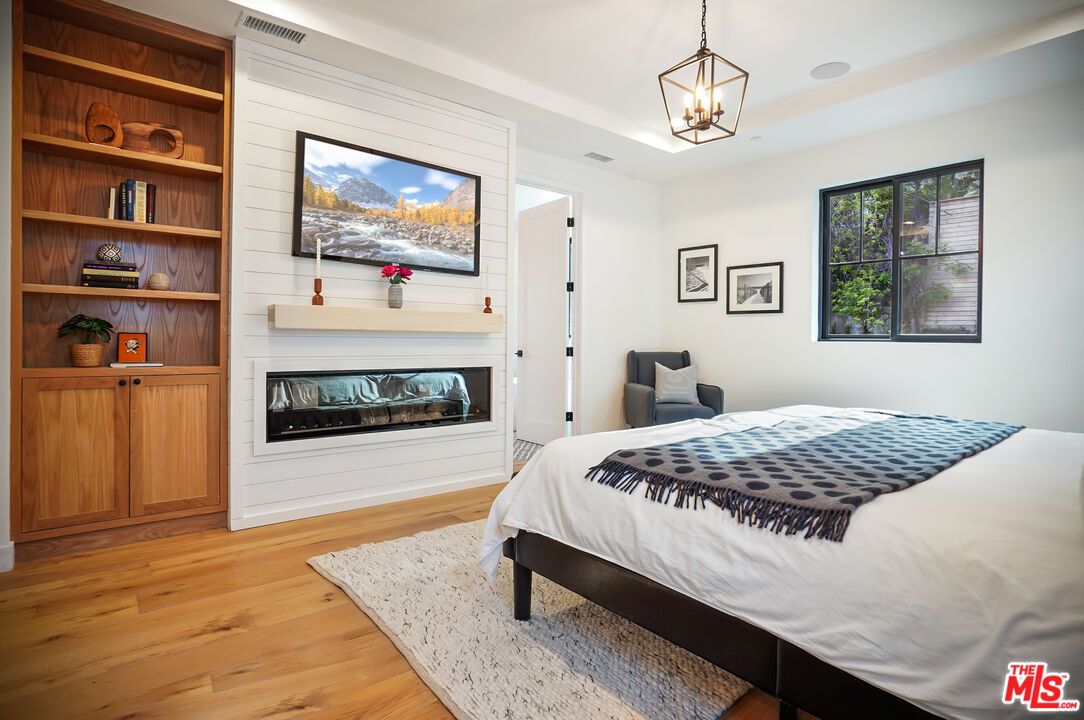 Bedroom, Fireplace, Interior, Pendant Lights, Wood Texture Flooring