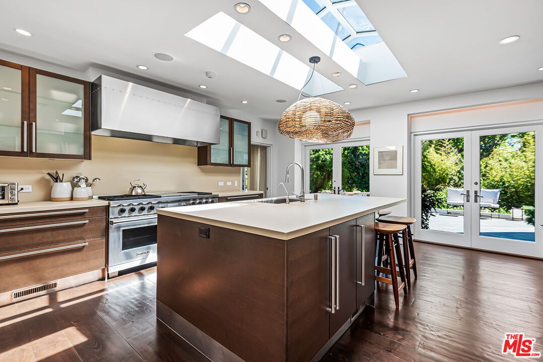 Glass Ceilings, Interior, Kitchen, Pendant Lights, Recessed Lighting, Stainless Steel Appliances, Wood Texture Flooring