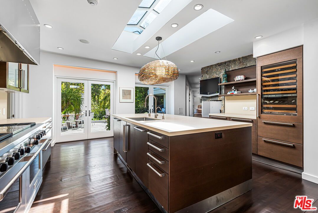 Glass Ceilings, Interior, Kitchen, Pendant Lights, Recessed Lighting, Stainless Steel Appliances, Wood Texture Flooring