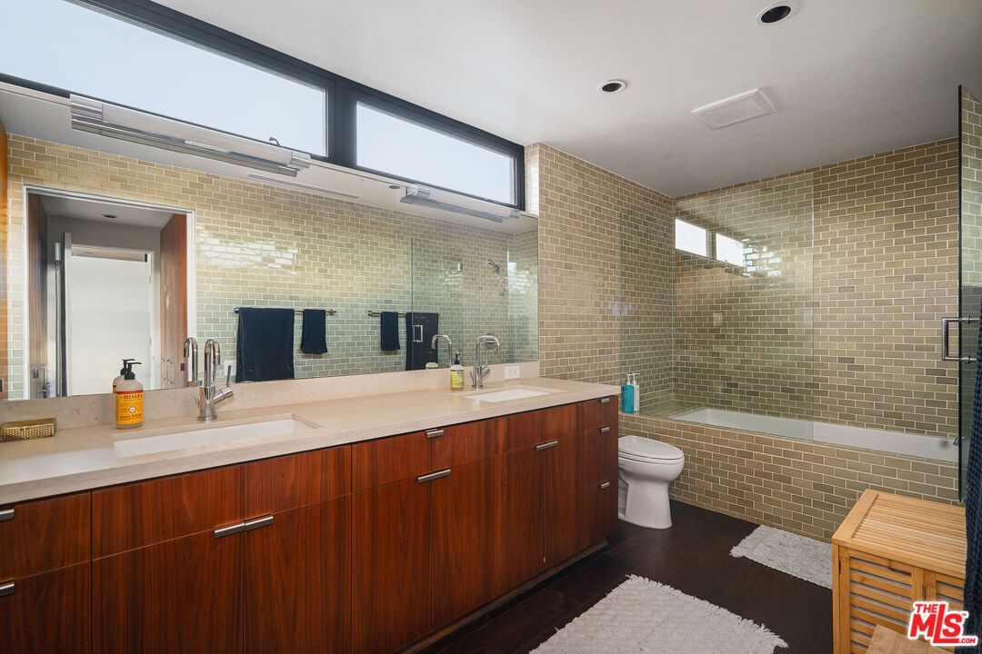Bathroom, Dual Sink Vanities, Glass Shower, Interior, Recessed Lighting, Wood Texture Flooring