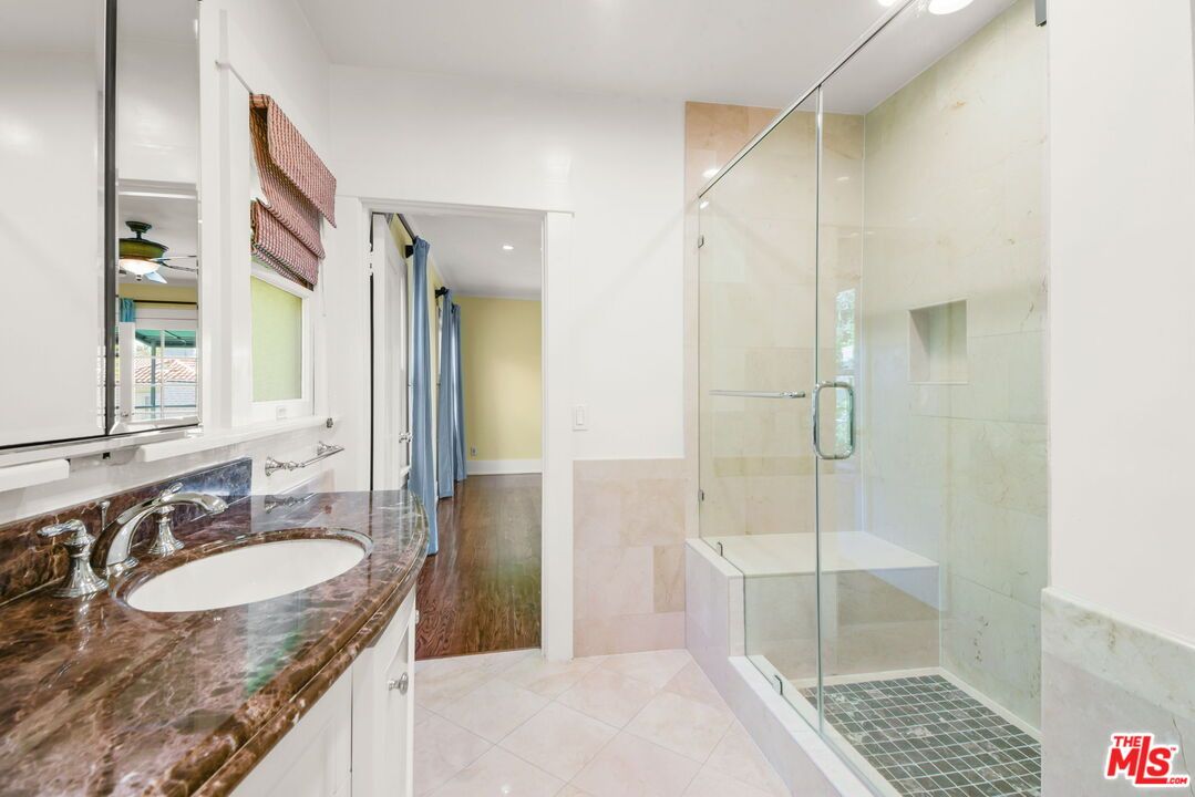 Bathroom, Dual Sink Vanities, Glass Shower, Interior, Recessed Lighting, Wood Texture Flooring