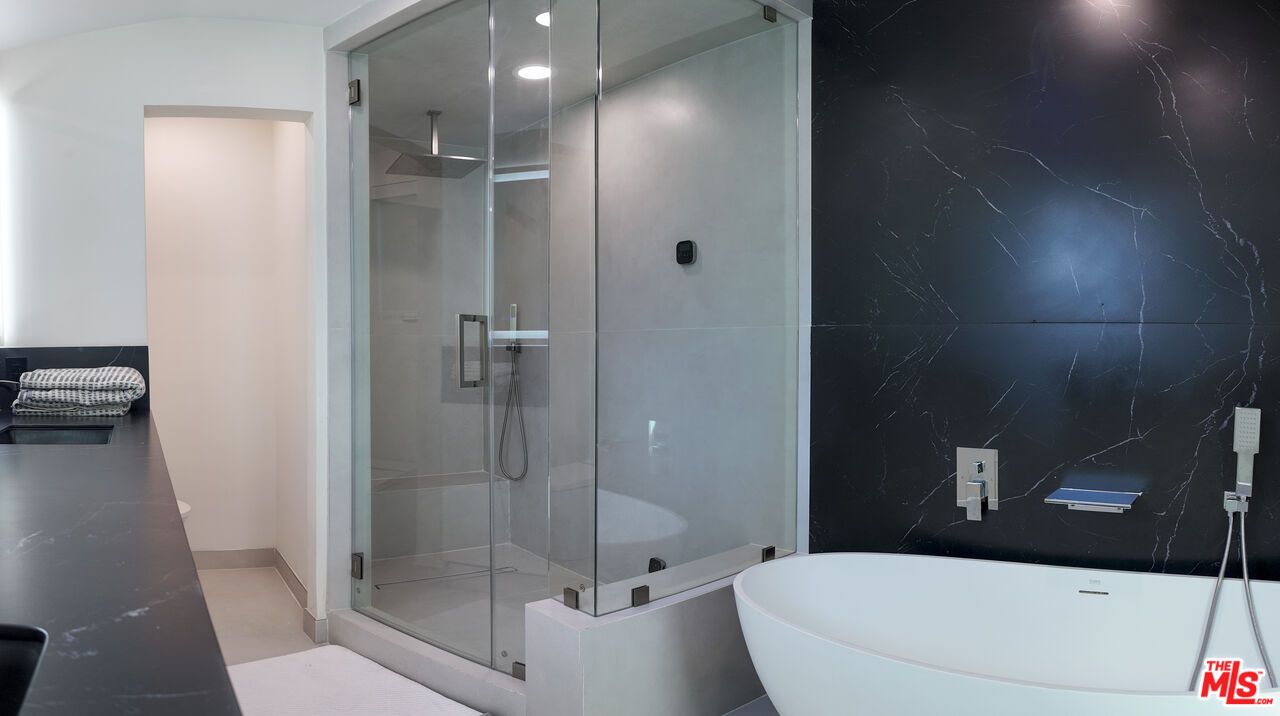 Bathroom, Free Standing Baths, Glass Shower, Interior, Marble Walls, Recessed Lighting